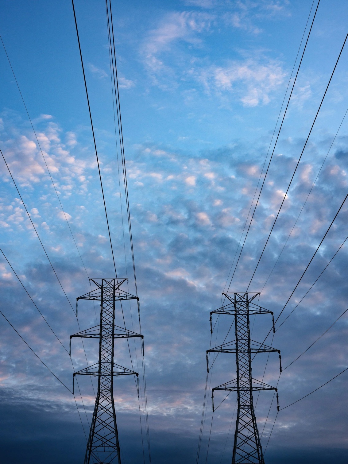 Power transmission lines at dusk