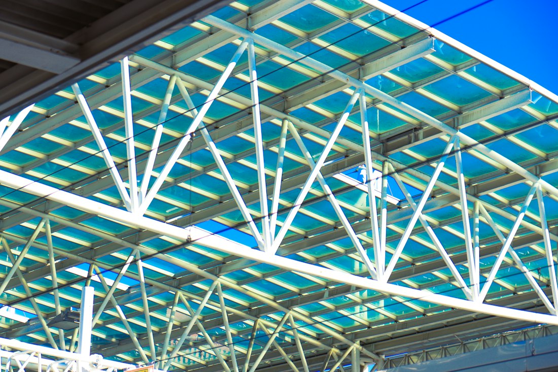 Steel framework structure against a blue sky